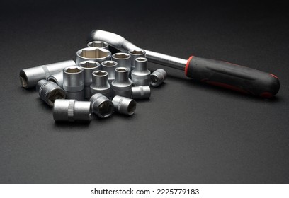 Sockets tools, wrenches, spanners and bits in a chrome socket set.repair equipment make of metal for ,maintenance industrial, you can buy toolsbox set this at shop online easily.