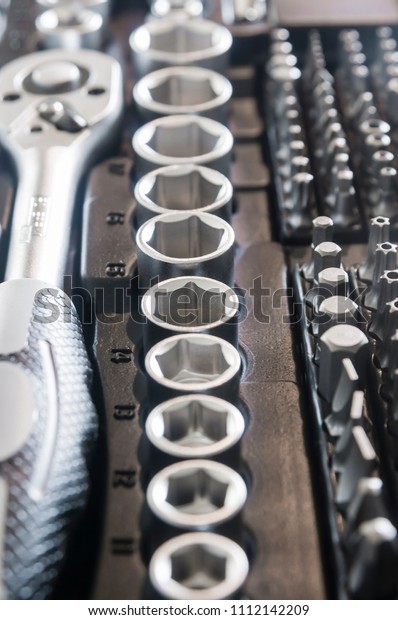 Sockets, tools, wrenches, spanners and bits in a\
chrome vanadium socket\
set.