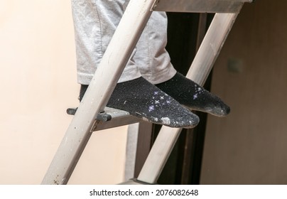 Socks On My Feet In Paint On The Stairs.