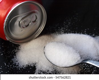 Soda Can And White Sugar Spoon      