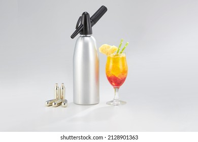 Soda Drinks Carbonate Oxide lemonade liquid make by CO2 Siphon Dispensder bottle and CO2 charger canister. Barista tool kit soda maker with color layer ice soda drinks - Shutterstock ID 2128901363