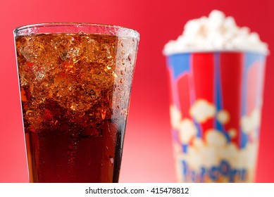 a soda and popcorn - Powered by Shutterstock