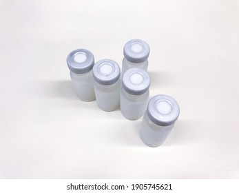 Sodertalje-Sweden - January 2021: Group Of Frosted Vials With Crimp Cap Taken Out From A Container With Dry Ice After Professional, Medical Transport. Selected Focus.