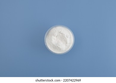 Sodium Carboxymethyl Cellulose Powder, NaCMC. Food Additive E466 In Bowl, Top View. Stabiliser And Thickener. Agar And Gelatin Replacer. Glazing Agent.