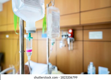 Sodium Chloride Or Saline Solution Fluid Iv Irrigation Transparent Drip Bag And Tubing At Room In Hospital