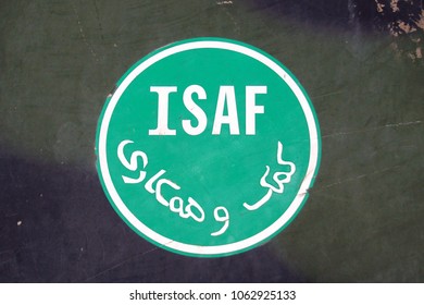 Soesterberg, The Netherlands - April 2, 2018: International Security Assistance Force (ISAF) Logo On The Side Of A Military Car. ISAF Was A NATO-led Security Mission In Afghanistan.