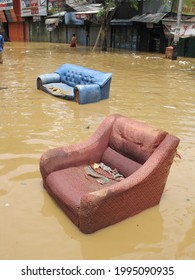 Sofa Carried By Flood Currents During A Flood In Jakarta, Indonesia, February 6, 2007