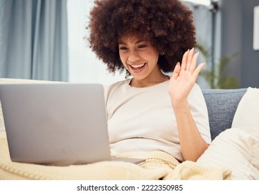 Sofa, Laptop And Wave, Black Woman On Video Call With Women, Happy Sitting In Living Room. Relax At Home, Chat Online And Connect, A Woman With Smile On Internet Networking Communication On Videocall.