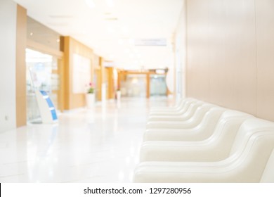 Sofa In Waiting Area Of Luxury Hospital. Clinic Corridor Interior Background. Healthcare And Medical Concept