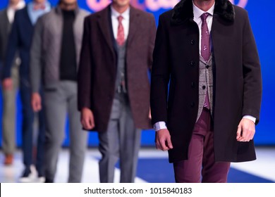 Sofia, Bulgaria - 28 September 2017: Male Models Walk The Runway In Stylish Suits During A Fashion Show. Fashion Catwalk Event Showing New Collection Of Clothes. Single Model.