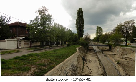 Sofia, Bulgaria - April 19, 2014. Perlovska River Close To Khan Kubrat Subway Station. Cloudy Spring View.