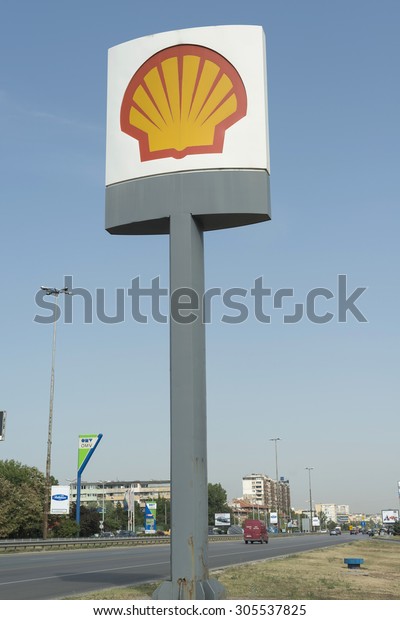 Sofia, Bulgaria - August 05, 2015: Shell Oil\
filling station sign and logo on a road. Shell Oil Company is among\
the largest oil companies in the\
world.