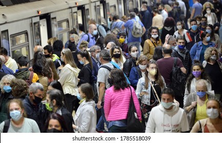 Sofia, Bulgaria - June 23 2020: Subway Train Passengers With Protective Masks Crowding To Get On And Off Subway Station Platform On Serdika Metro Station.