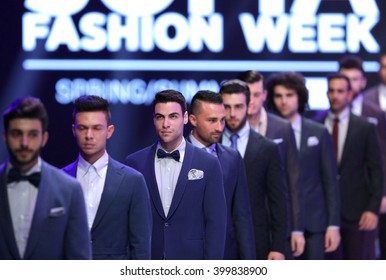 Sofia, Bulgaria - March 23, 2016: Male Models In Suits Walk The Runway During The 2016 Sofia Fashion Week Show In Sofia, Bulgaria.
