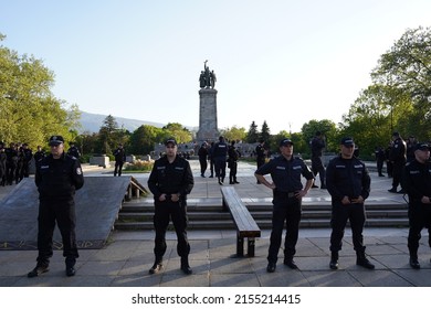 Sofia, Bulgaria - May 09, 2022: Police officers guard the monument to the Soviet army, where its defenders gathered, with several cordons as a march in support of Ukraine approaches