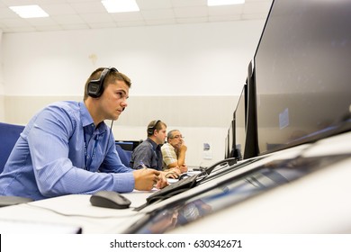 Sofia, Bulgaria - September 12, 2016: A Controller In Bulgarian Air Traffic Services Authority's Surveillance Control Room Is Navigating Airplanes Of Sofia's Airport. 