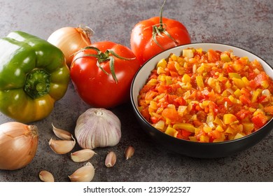 Sofrito Base Sauce From Fresh Vegetables Close-up In A Bowl On The Table. Horizontal
