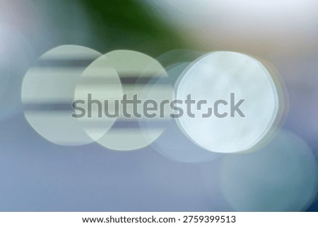 Soft abstract bokeh background with overlapping light circles and smooth gradient, ideal for modern design and visual templates