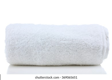 Soft Bath Towel Rolled Up On A White Isolated Background