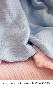 Soft Blue Baby Blanket Closeup. Pressed Muslin, Blue And Pink Baby Blankets. Fabric, Textiles, Clothing Concepts