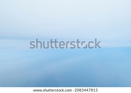 Soft blue background texture: blurred color gradient backdrop or wallpaper.