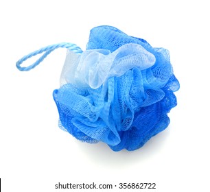 Soft blue bath puff or sponge isolated on white background with copy space. 