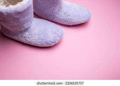 Soft Blue Homemade Ugg Boots On A Pink Background.