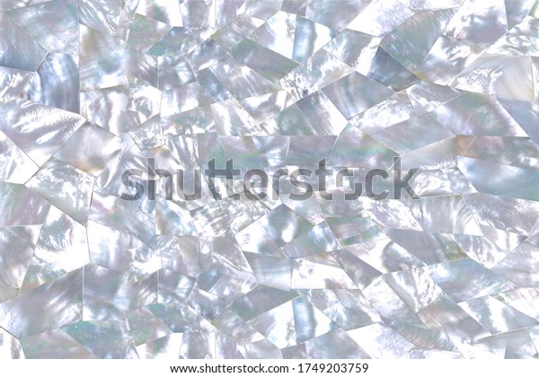 Soft blue\
mother of pearl texture in faceted\
pattern