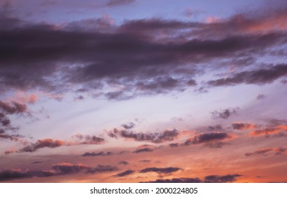 A soft blue and orange sky during a nice sunset.