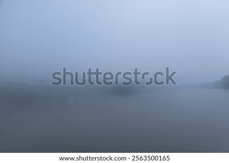 Soft blue river landscape impressionist background in the Pantanal.