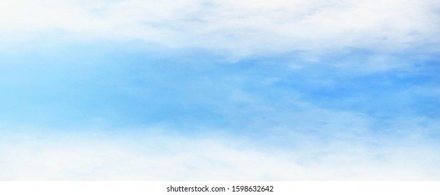 Soft Blue Sky And Blurred Fade White Clouds At Top And Bottom Side For Natural Background Design.