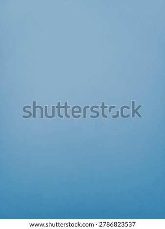 Soft blue solid color backdrop with subtle vignette, empty space for text or product display