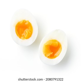 Soft boiled eggs isolated on white background, top view