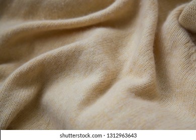 Soft cashmere Textur, gemütlicher, warmer Kaschmirpulli oder Deckenstruktur, Nahaufnahme 