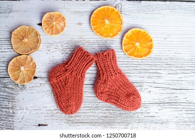 Soft And Chunky Baby Socks, On White Old Table