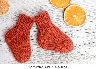 Soft And Chunky Baby Socks, On White Old Table