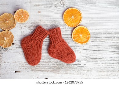 Soft And Chunky Baby Socks, On White Old Table