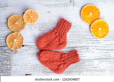 Soft And Chunky Baby Socks, On White Old Table