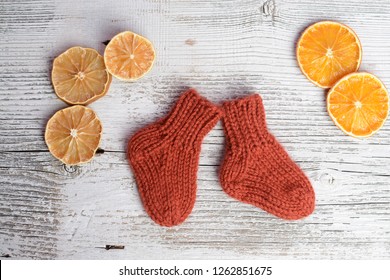 Soft And Chunky Baby Socks, On White Old Table