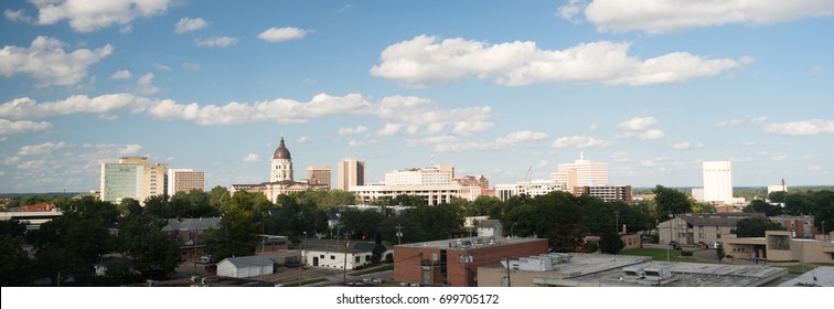Soft clouds and blue skies appear over Topeka, Kansas USA