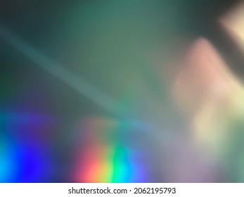 Soft color streaks and rainbow light glares around the edge for overlay of background - Shutterstock ID 2062195793