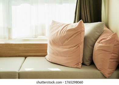 soft cozy pillows on modern sofa background home design concept - Shutterstock ID 1765298060