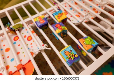 Soft cubes inserted in the skins of the playpen.