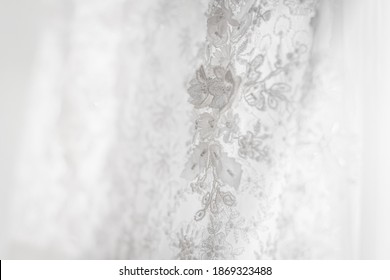 
soft detail of the texture of a wedding dress