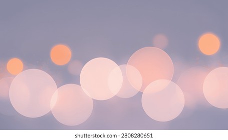 Soft and dreamy abstract background featuring out of focus light bokeh circles in shades of pink orange and lavender perfect for romantic or festive designs