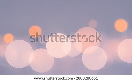 Soft and dreamy abstract background featuring out of focus light bokeh circles in shades of pink orange and lavender perfect for romantic or festive designs