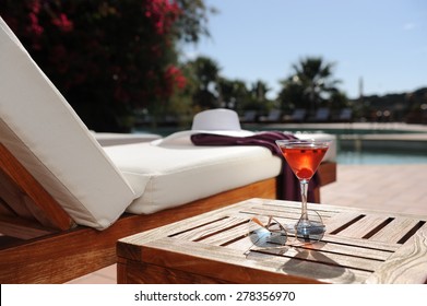 Soft Drink In A Beach Chair By The Pool Of A Luxury Hotel