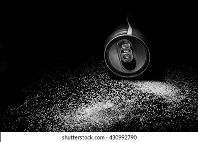 Soft Drink Can Spill With White Sugar : Isolate Black Background