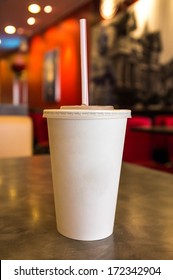 Soft Drink In White Paper Cup In Fast Food Restaurant