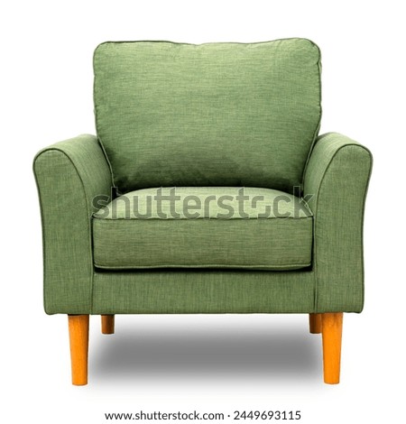 soft empty green single sofa stands on white isolated background, comfortable fabric couch is alone against the background of white wall